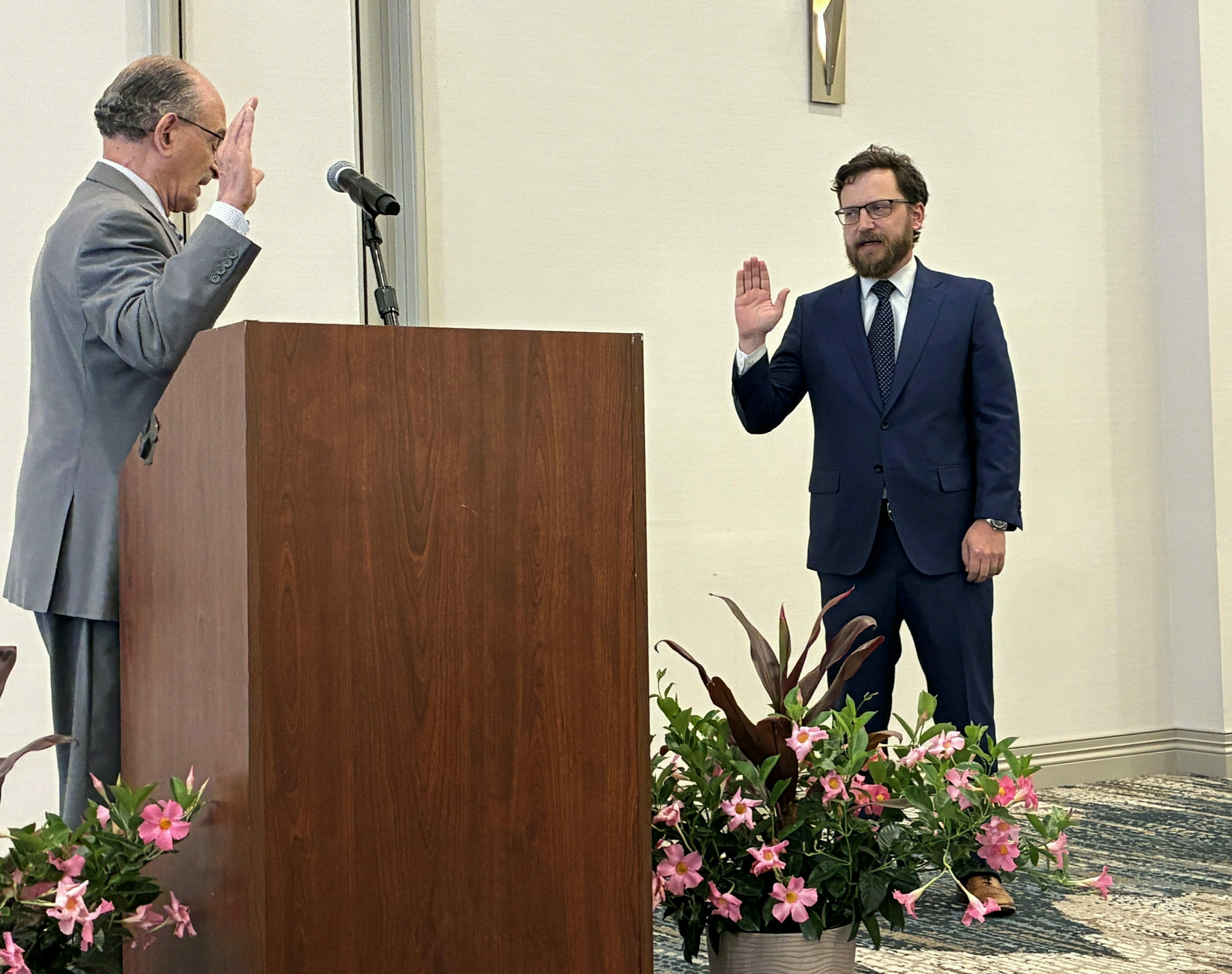 Robert C. Tucker being sworn in